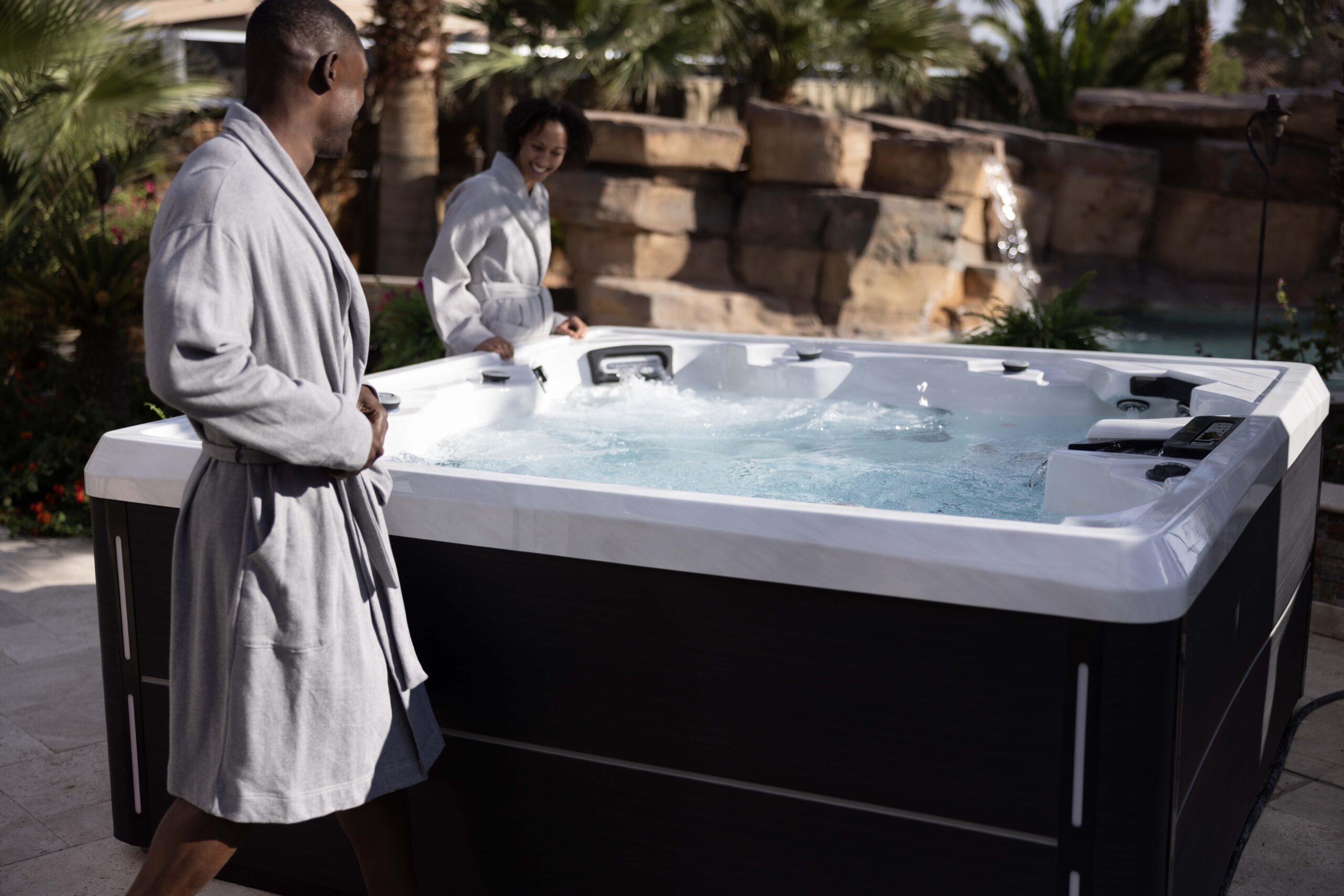 artesian 2025 island spas with people enjoying its new features