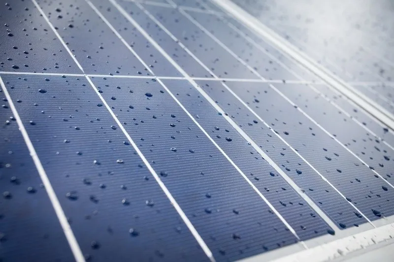 solar panel covered in rain